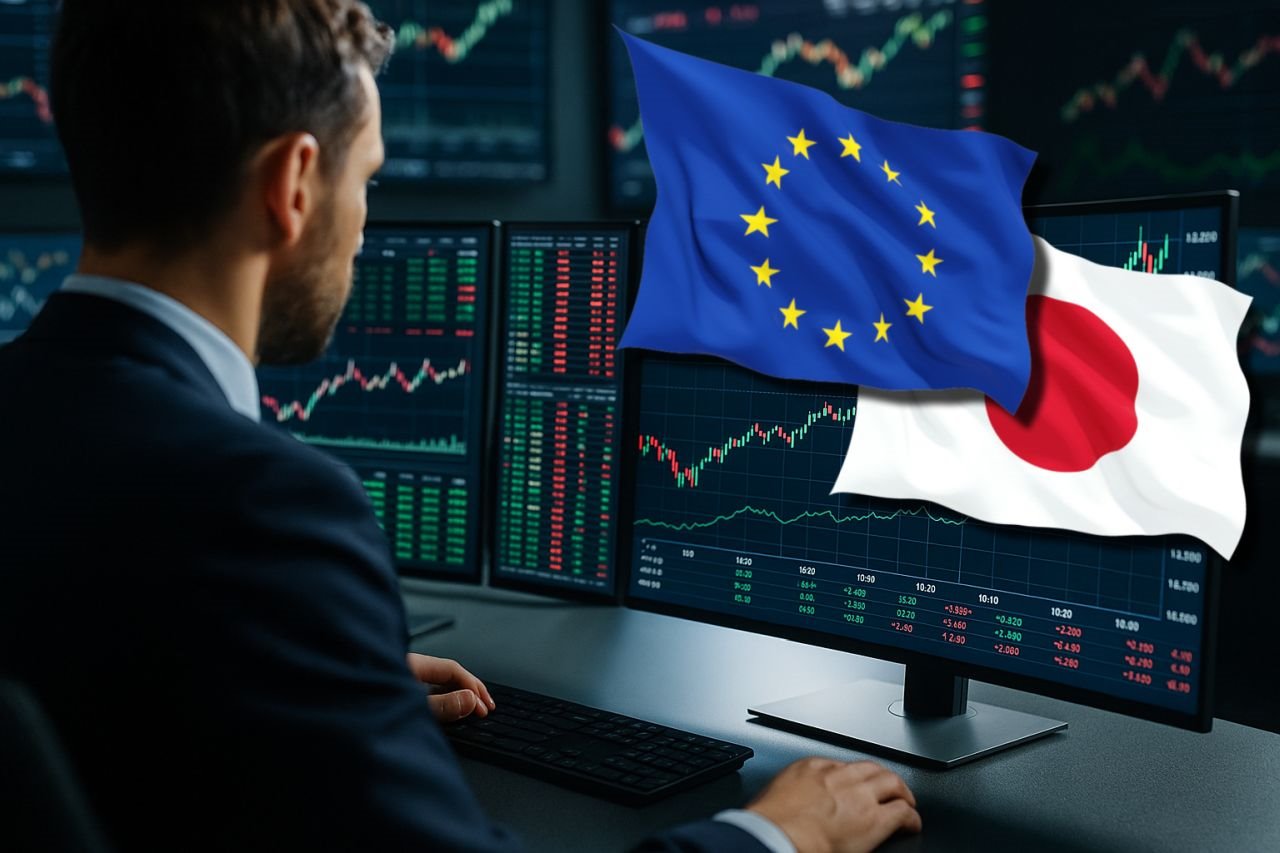 Un trader di spalle che osserva dei grafici finanziari su alcuni schermi. In sovrimpressione in alto a destra le bandiere di UE e Giappone